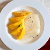 Mango Sticky Rice. · Traditional Thai dessert made with sweet sticky rice, fresh mango and coconut milk. Vegetari...