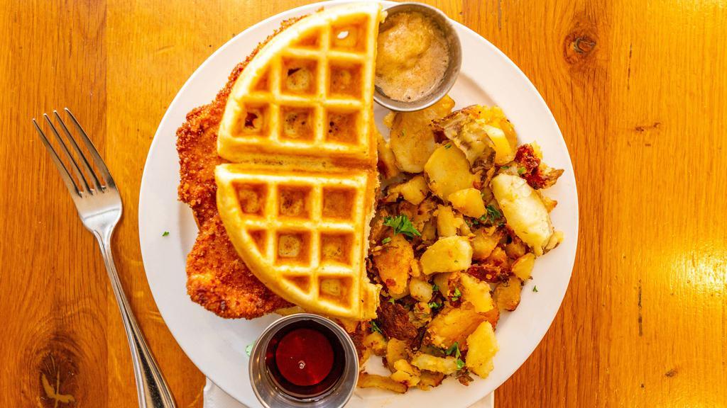 Chicken & Waffles · Fresh Belgian waffle, fried chicken breast, cinnamon butter and potato home fries.
