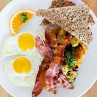 Eggs Your Way · Veggie. Gluten free for an additional charge. Two eggs with potato home fries and choice of ...