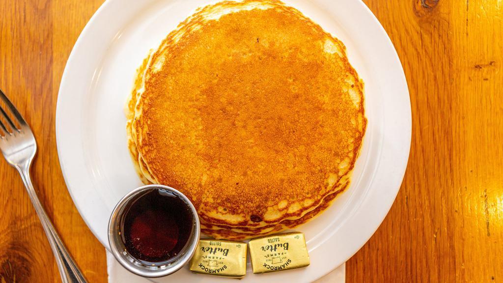 Buttermilk Pancakes · Veggie. Three pancakes, includes one topping and syrup.