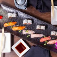 Tri-Color Sushi · 2 pieces tuna, 2 pieces salmon, 2 pieces yellowtail and a magic roll.
