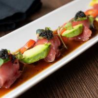 +Bluefin Tuna · Thinly sliced Bluefin, avocado, tobiko with chef's special sauce.