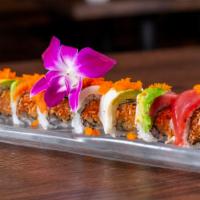 Rainbow Roll · Spicy crab, cucumber topped w/assorted fish & avocado.