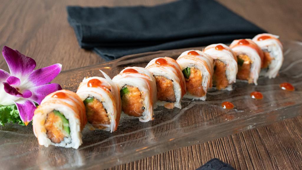 +4. Spicy Girl Roll · Spicy tuna, salmon, cucumber, jalapeño inside; crab meat on top with chili sauce.