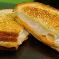 Grilled Cheesy · Cheddar & Swiss On Choice Of  Grilled Bread.