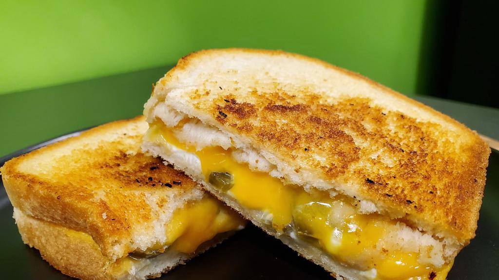 Jalapeno Popper Grilled Cheesy · Cream Cheese, Cheddar & Jalapeno Choice Of  Grilled Bread.