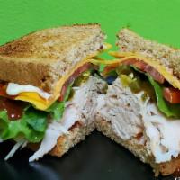 Chipotle Turkey · Turkey, Lettuce, Tomato, Jalapeno, Cheddar, Mayo & Chipotle Drizzle On Choice Of Toasted Bre...