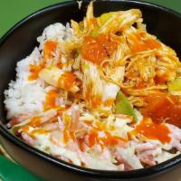 Buffalo Bowl · Slow-Cooked Chicken, Tomato & Avocado Grilled In Our Buffalo Sauce Served Over Coleslaw & Rice