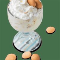 Down Home Banana Pudding · Rich and creamy banana pudding with slices of fresh bananas and vanilla wafers, covered in w...