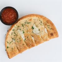 Take It Cheezy · garlic & evoo, parmesan, oregano, mozzarella, w/ side marinara or pesto