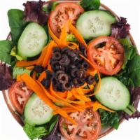 Going Green · Cucumber, tomatoes, shaved carrots, black olives, sunflower seeds, house Italian dressing.