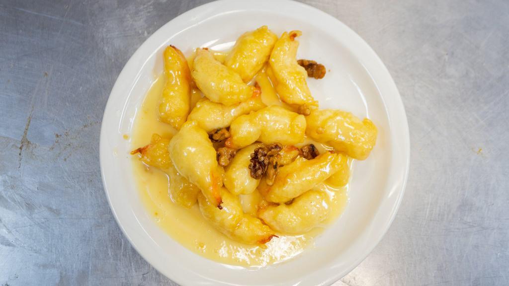 Walnut Shrimp Or Chicken · Delicately seasoned jumbo shrimp or chicken, lightly fried to golden brown in white creamy sauce.