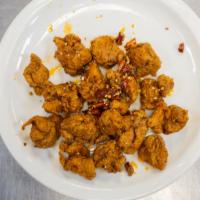 Spicy Chicken · Spicy. Lightly fried chicken sautéed in spicy salty pepper flavor. Choice of bone-in or bone...