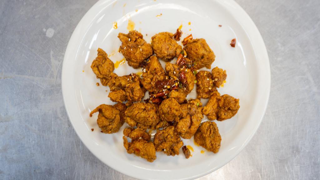 Spicy Chicken · Spicy. Lightly fried chicken sautéed in spicy salty pepper flavor. Choice of bone-in or boneless.