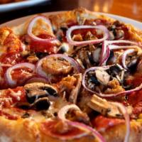The Omnivore (16 Inch) · Pepperoni, sausage, red onion, mushrooms, black olives, mozzarella and Parmesan cheeses.