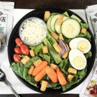 Garden Salad (Half) · Garden salad is served with bell peppers, carrots, cheese, croutons, cucumbers, egg, red oni...