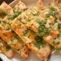 Chicken Paratha · Flatbread stuffed with Chicken, Onions, Cilantro, and Indian spices cooked in Tandoor oven. ...