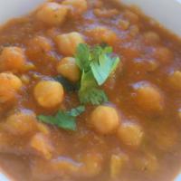 Chole Masala · Garbanzo beans cooked with onions, potatoes, tomatoes and spices. Gluten Free.