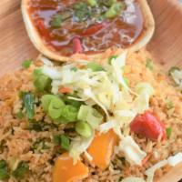 Vegetable Fried Rice · Street style fried rice with vegetables. Served with hot and sweet sauce. Vegan