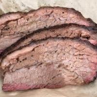 Texas Style Brisket · Prime Sliced or chopped brisket. Salt and pepper dry rub.  Chopped is saucy.