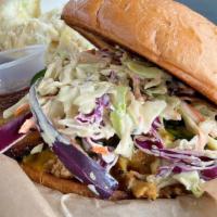 Pulled Pork · Topped with slaw.