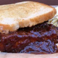 Dc Streets · Half a pound of our signature Memphis dry-rubbed pork ribs served on grilled white bread and...