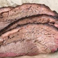 Texas Style Brisket (1/2 Lb.) · Prime Brisket. Sliced or chopped and saucy. Salt and pepper dry rub. Chopped is saucy.