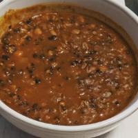 Dal Soup · Mildly spiced yellow lentil soup seasoned with spices and herbs.