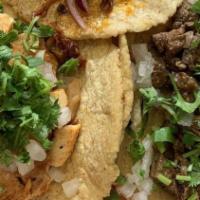 Tacos · Onions cilantro,cilantro and choice of meat: chorizo,steak, carnitas, chicken.