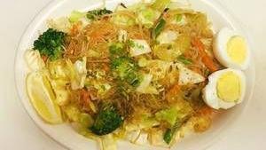Pancit Bihon · Fine rice noodles stir fried with your choice of protein and an assortment of vegetables, to...