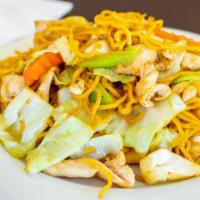 Pancit Canton · Egg noodles stir fried with your choice of protein and an assortment of vegetables, topped w...