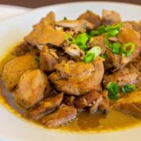 Chicken Adobo · Chicken cooked in soy sauce, vinegar, garlic, and black pepper. A Filipino favorite.