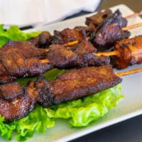 Bbq Skewers (Chicken Or Pork) · Filipino style BBQ skewers with our delicious BBQ sauce.