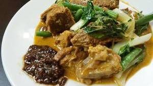 Beef Kare Kare · Beef and assorted vegetables slow cooked in peanut sauce and served with bagoong.