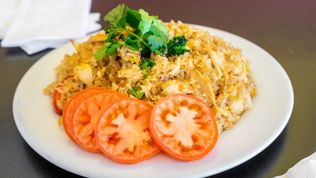 Thai Crab Fried Rice · Thai style fried rice with fresh crab meat, eggs, and onions.