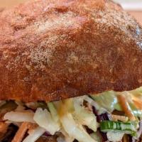 Shoyu Chicken Sandwich · Tender Shoyu Chicken Thigh with Creamy Cabbage & Pineapple Slaw and Spicy Mayo on Toasted Po...