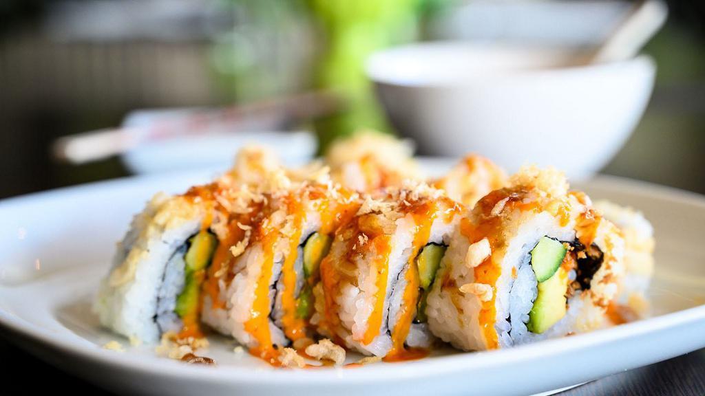 The Crunch Roll · Delicious roll made with shrimp tempura, snow crab mix, fresh cucumber, and avocado topped with crunchy tempura flakes.