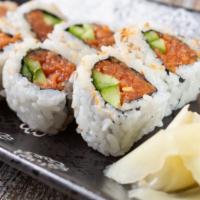 The Spicy Tuna Roll · A delicious roll with fresh tuna seasoned with Sriracha sauce and sesame oil.