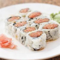 The Tuna Roll · Delicious roll made with sushi rice, nori (Seaweed) and sashimi-grade tuna.
