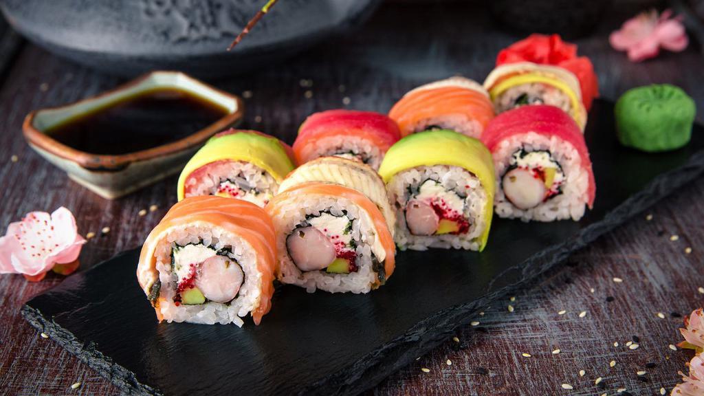 The Rainbow Roll · Delicious roll made from assorted fish and fresh avocado placed on top.