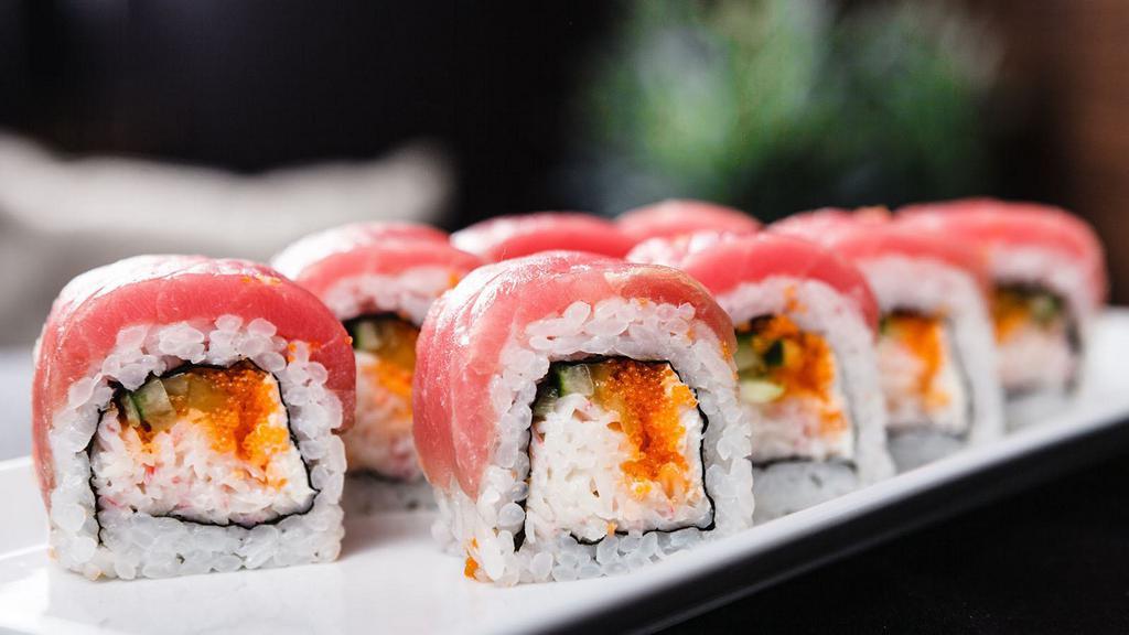The Tuna Lover Roll · Delicious spicy tuna roll on top of fresh tuna.