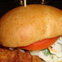 Crispy Chicken Sandwich · Our buttermilk fried chicken topped with cilantro slaw, tomato. Add Havarti cheese for an ad...