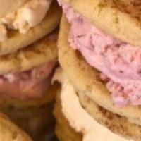 Banana Pudding  · Two of our peanut butter cookies with Blue Bells Banana Pudding ice cream sandwiched in betw...