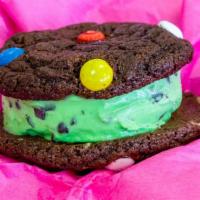 Mint Fantasy  · Two of our fudge fantasy cookies with creamy Blue Bell Mint chocolate chip  ice cream sandwi...