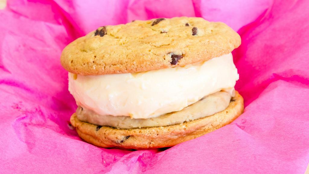 Cookie Dough · Two of our famous chocolate chip cookies, layered with our homemade edible cookie dough with Blue Bells homemade vanilla ice cream sandwiched in the middle.