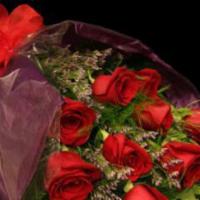 Dozen Roses · Wrapped with care for your special person.