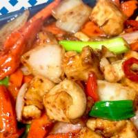 Pad Cashew · Stir fried choice of meat with chili paste, bell peppers, carrot, cashew nuts, onions, and g...
