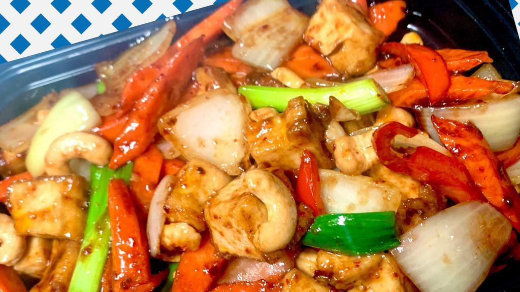 Pad Cashew · Stir fried choice of meat with chili paste, bell peppers, carrot, cashew nuts, onions, and green onion.
