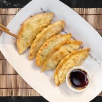 Chunky Potstickers · 5 pieces of fried Korean dumplings filled with beef, pork, and vegetables.