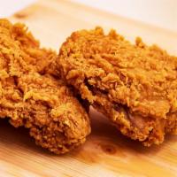 Dark Chicken (2 Pieces) · Mouthwatering fried chicken drumstick and thigh, served with a side of your choice.